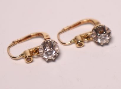 Pair of yellow gold sleepers set with 2 small...