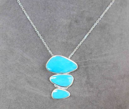 Pendentif en argent massif soutenant en dégradé...
