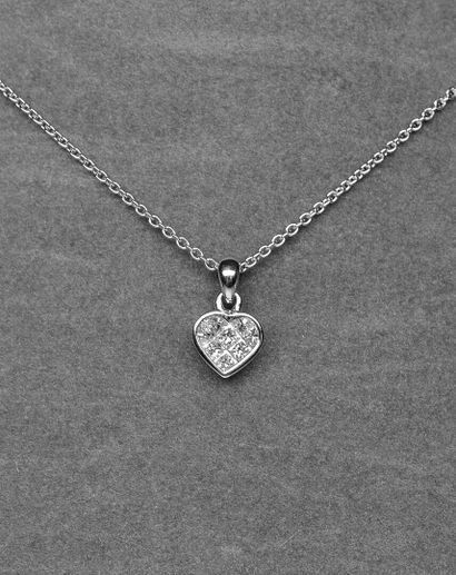 Heart-shaped pendant in white gold set with...