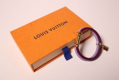 LOUIS VUITTON. Bracelet en métal doré à 2...
