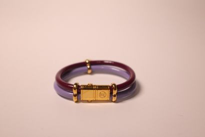 LOUIS VUITTON. Bracelet en métal doré à 2...