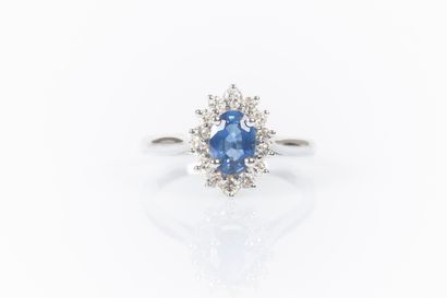 Bague marguerite en or blanc 750°/.(18K)...