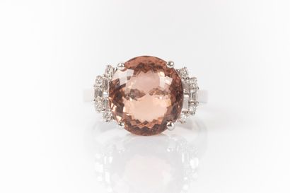 White gold ring set with an oval tourmaline...