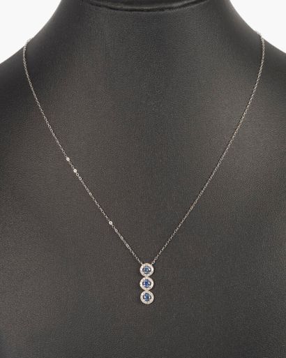 Collier Trilogie en or blanc 750°/.(18K)...