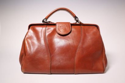POURCHET. Sac en cuir havane, dust bag.