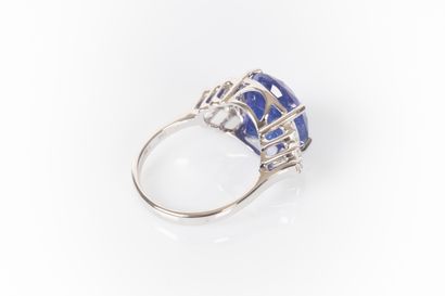 White gold ring set with a round tanzanite...