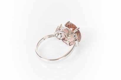 White gold ring set with an oval tourmaline...
