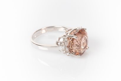 White gold ring set with an oval tourmaline...