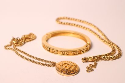 Christian DIOR. Ensemble de bijoux en métal...
