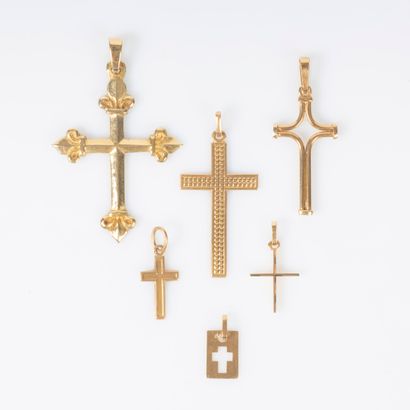 A lot of 6 crosses in yellow gold 18K 750...