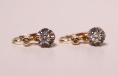 Pair of yellow gold sleepers set with 2 small...