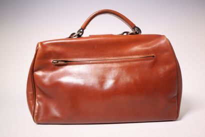 POURCHET. Sac en cuir havane, dust bag.