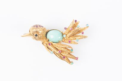 Broche en or jaune ornée de pierres semies...