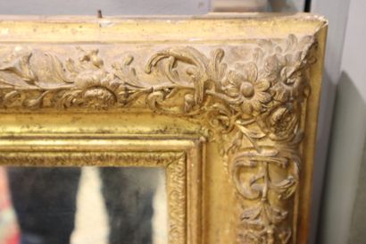 Rectangular glass, gilded frame with palmettes....