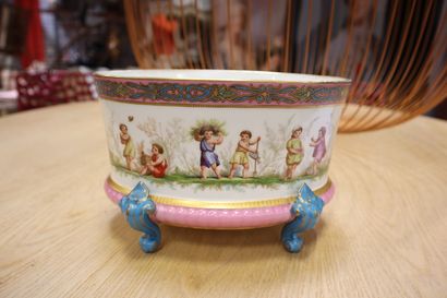 Polychrome porcelain cache pot decorated...