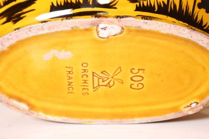 Yellow and black ceramic trim (3 pieces)...