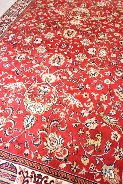 Wool carpet with red background. 297 x 201...