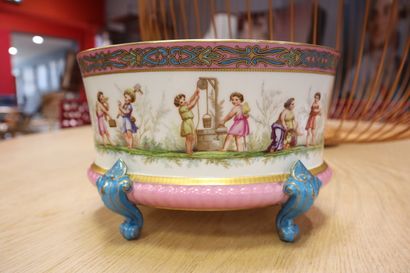 Polychrome porcelain cache pot decorated...