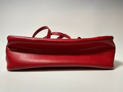LOUIS VUITTON. Red leather bag.