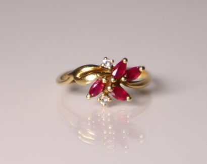 Yellow gold ring set with 2 small diamonds...