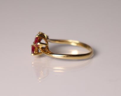 Yellow gold ring set with 2 small diamonds...