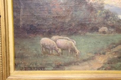 J. DEBANNE (XIXth) Shepherdess and her sheep,...
