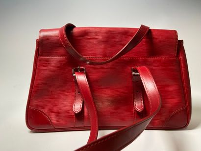LOUIS VUITTON. Red leather bag.