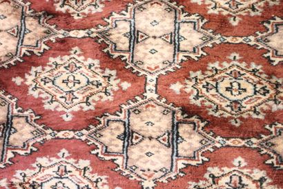 Wool carpet with brown background. 295 x...