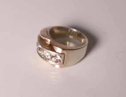 White gold ring set with 4 white stones....