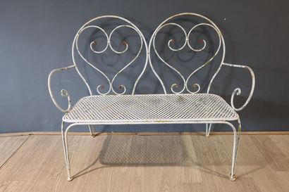 Banc de jardin en fer forgé laqué blanc....