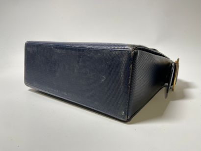 YVES SAINT LAURENT. Navy leather bag.
