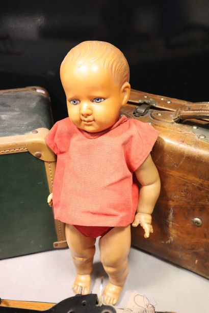 Lot including: Celluloid bather, leather...