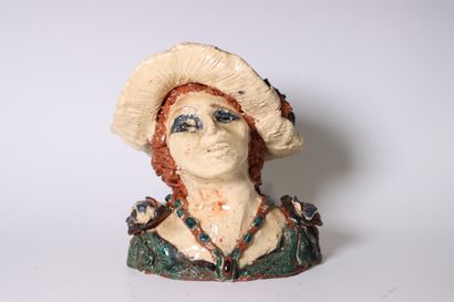 Polychrome terracotta bust of a woman with...
