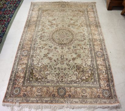 KAYSERI Oriental silk carpet with beige background....