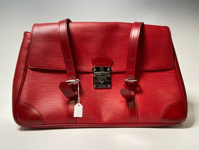 LOUIS VUITTON. Red leather bag.