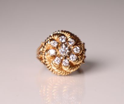 Yellow gold daisy ring set with a central...