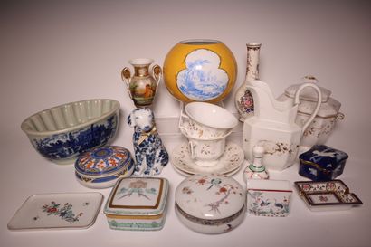 Set of porcelain trinkets, including: cups,...