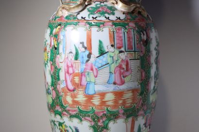 CHINA. Canton polychrome porcelain vase....
