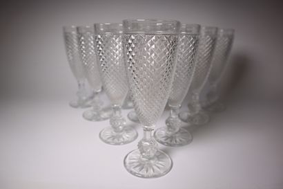 Set of ten molded crystal champagne flutes,...