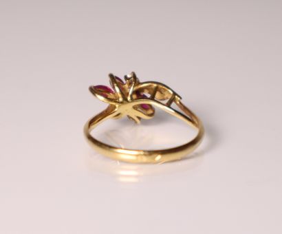Yellow gold ring set with 2 small diamonds...