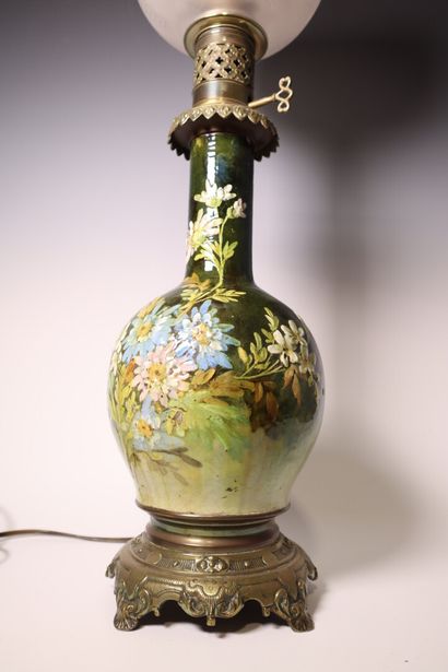 Polychrome ceramic kerosene lamp with flower...