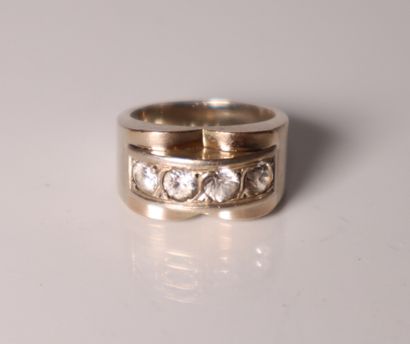 White gold ring set with 4 white stones....