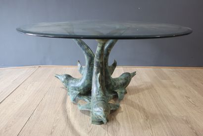 Table de repas piétement en bronze à patine...