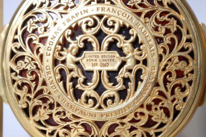 Flacon de cognac Frapin en métal doré. Vide....
