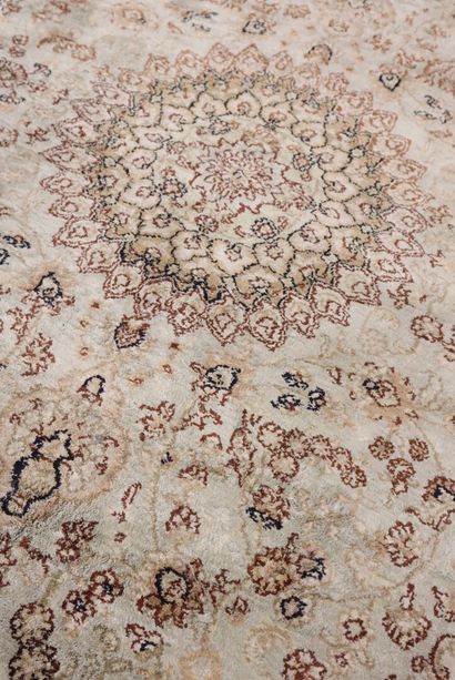 KAYSERI Oriental silk carpet with beige background....