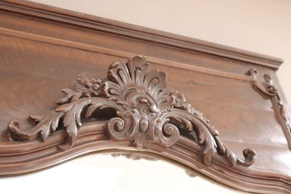Large pedimented mirror in carved natural...