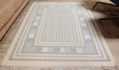 INDIA. Flat woven rug with geometric design...