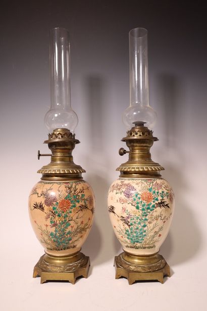 Pair of fine earthenware oil lamps mounted...