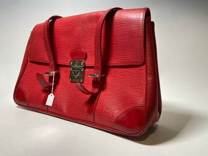 LOUIS VUITTON. Red leather bag.