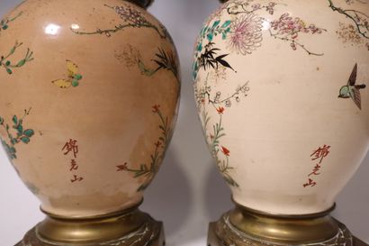 Pair of fine earthenware oil lamps mounted...
